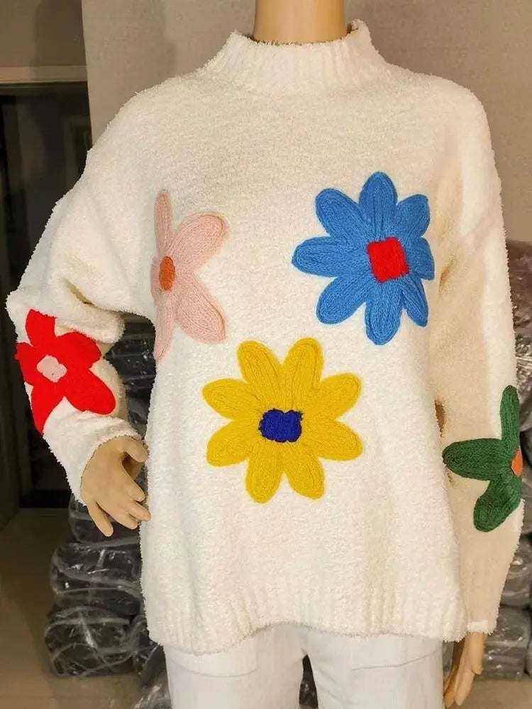 Elegante witte gebreide trui met bloemmotief voor vrouwen