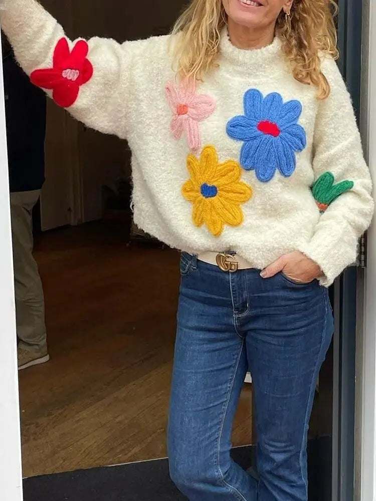 Elegante witte gebreide trui met bloemmotief voor vrouwen