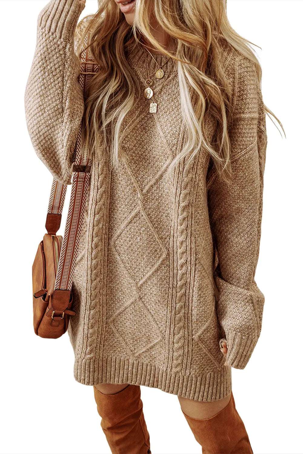 Knitted cable knit sweater dress with a loose fit 